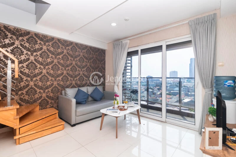 Living Room Maqna Residence 2BR Fully Furnished