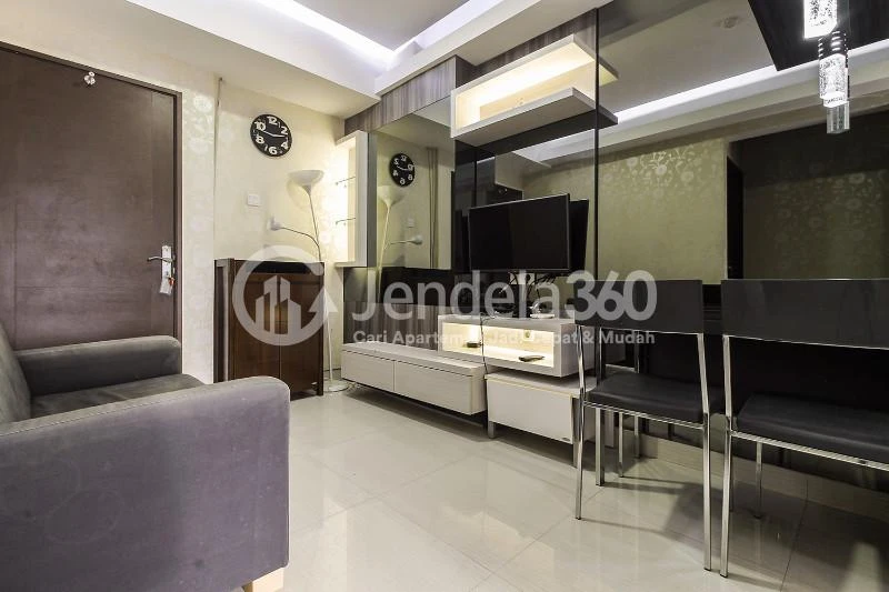 Living Room Peaceful 2BR Apartment with Elegant Modern Interior at Puri Park View Apartment