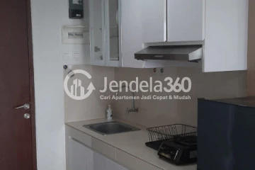 Kitchen Homey 1BR Apartment at Springwood Residence Tower A