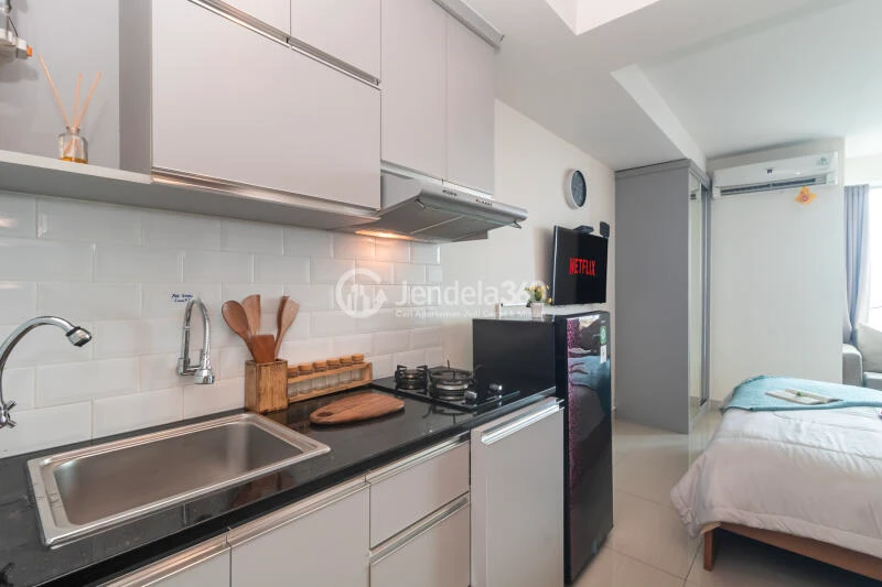 Kitchen High Floor Studio Apartment with - View at Grand Kamala Lagoon Apartment