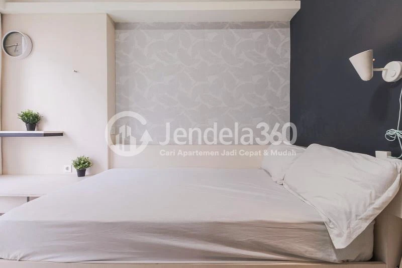 Bedroom Cozy Studio Apartment with Direct Access to Universitas Indonesia Train Station at Taman Melati Margonda Apartment