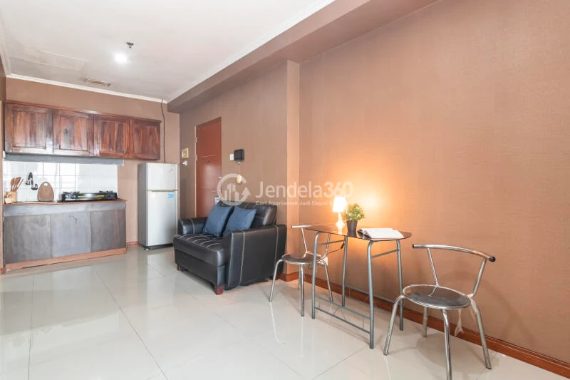 Living Room Homey 2BR Apartment High Floor with City View at Green Central City Apartment