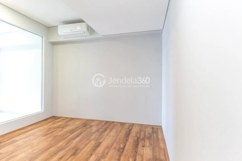 Bedroom 2 Restful 2BR Apartment Middle Floor with City View at Maqna Residence