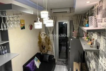 Living Room Homey 1BR Apartment at Paragon Village Apartment Tower B