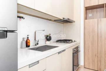 Kitchen Flawless 2BR Apartment Middle Floor with Toll Road View at Izzara Apartment