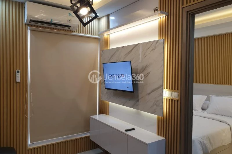 Living Room Strategic Location 2BR Apartment Low Floor with  View at Podomoro Golf View Apartment