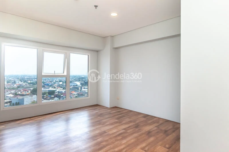 Bedroom 1 Restful 2BR Apartment Middle Floor with City View at Maqna Residence