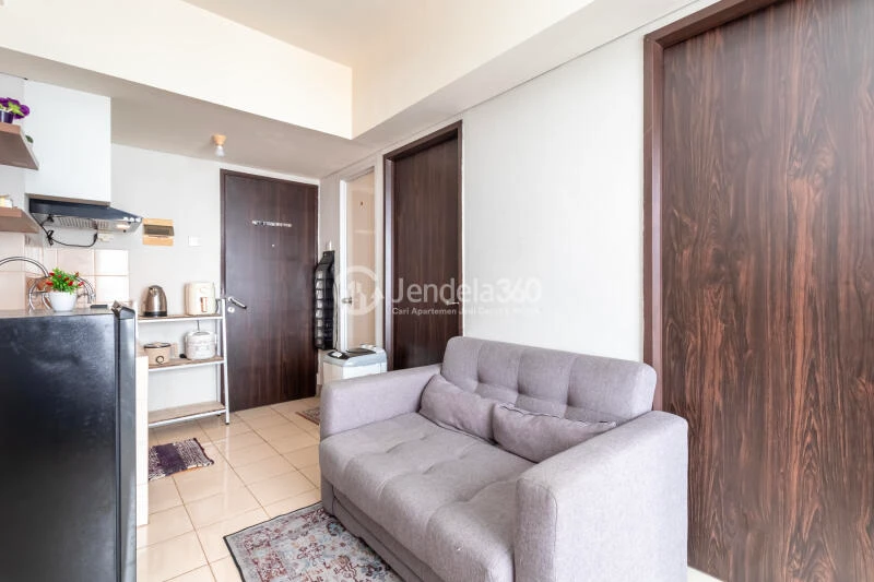 Living Room Comfortable 2BR Apartment Low Floor with city View at Serpong Green View Apartment
