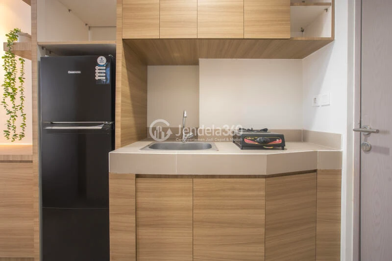 Kitchen An High Floor Studio Apartment with Exotic Pool with City View at Vasanta Innopark Apartment