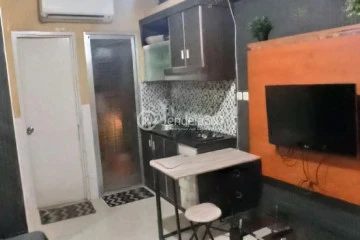 Living Room Modern 2BR Apartment at Kalibata City Green Palace Tower Mawar