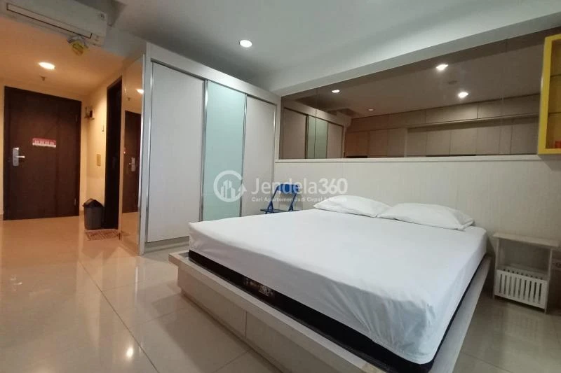 Bedroom Homey Studio Apartment at Tamansari The Hive Middle Floor
