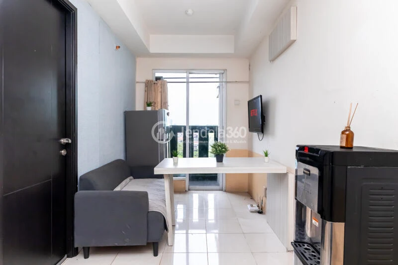 Living Room 1BR Apartment with City View at Belmont Residence