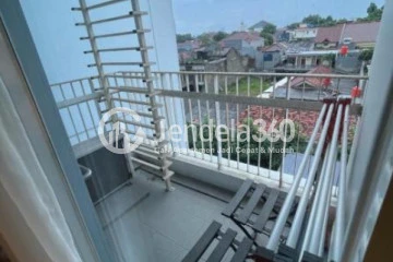 Balcony Well Furnished Studio Apartment Low Floor with City View at Aspen Residence Apartment