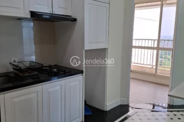 Kitchen High Floor 1BR Apartment with City View at Callia Apartment