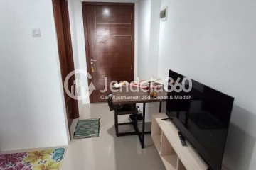 Living Room Peaceful 1BR Apartment Middle Floor with  View at Vittoria Residence