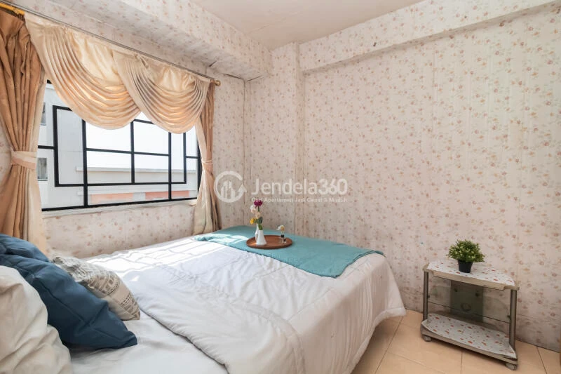 Bedroom 1 Cozy 2BR Apartment at Gading Nias Apartment Tower Dahlia