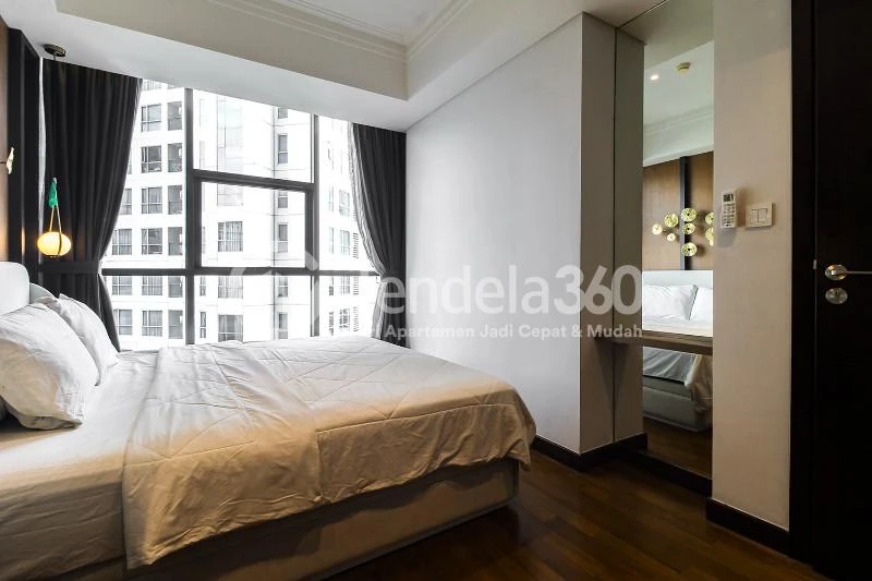 Bedroom 1 Restful 2BR Low Floor Apartment at Casa Grande Apartment