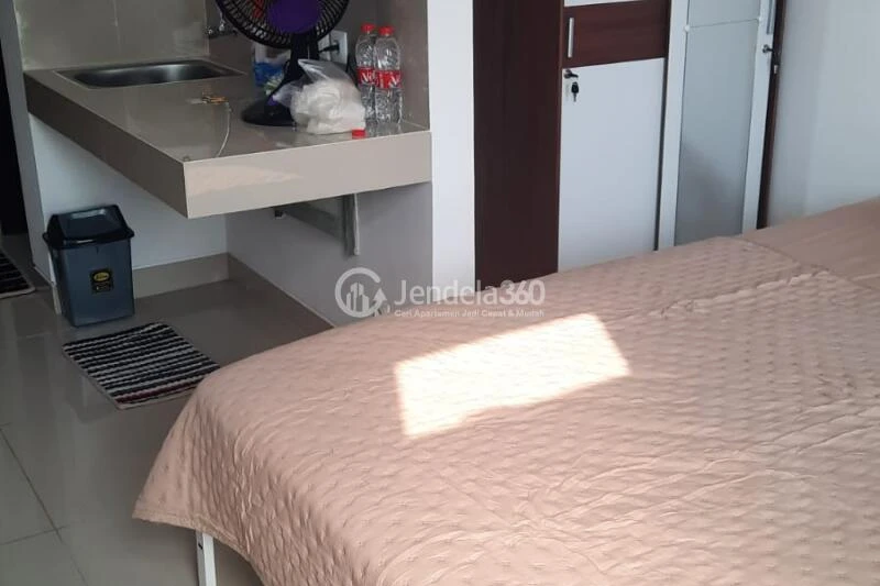 Bedroom Studio Pesona Depok Square Apartment at Middle Floor