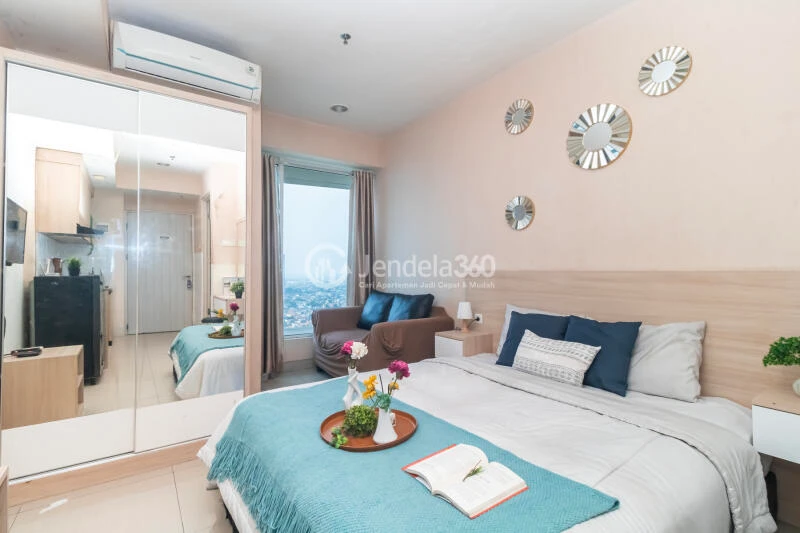Bedroom High Floor Studio Apartment with City View at Grand Kamala Lagoon Apartment