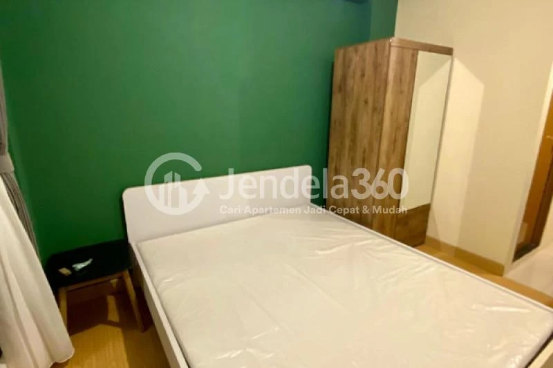 Bedroom Restful Studio Apartment Low Floor with  View at Tifolia Apartment