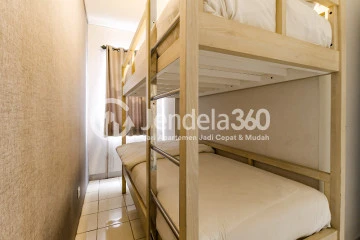 Bedroom 2 Family Friendly 2BR Apartment with City View at Serpong Green View Apartment