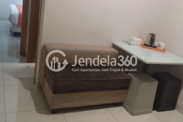 Living Room Relaxed 1BR Apartment Middle Floor with city View at The Mansion Kemayoran Bougenville