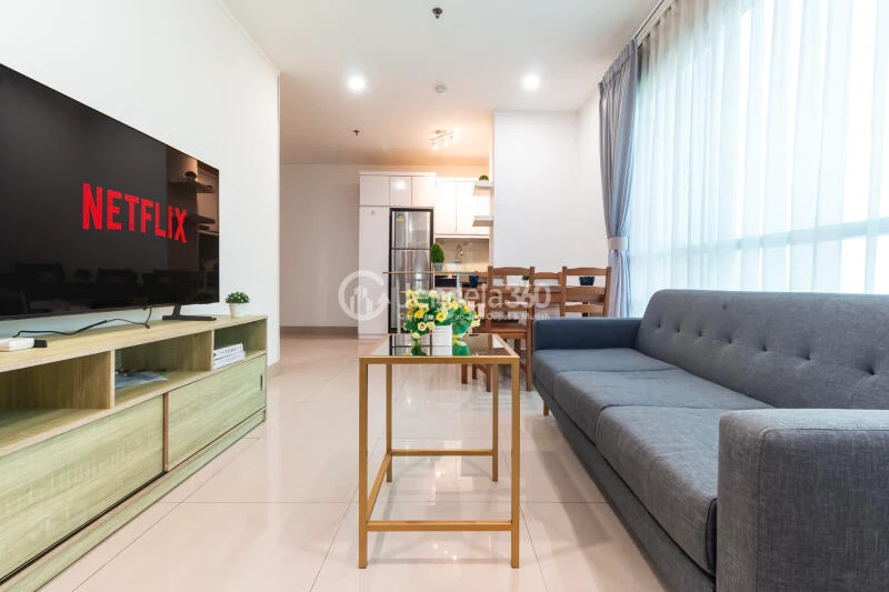 Living Room High Floor 2BR Apartment with City View at Sahid Sudirman Residence