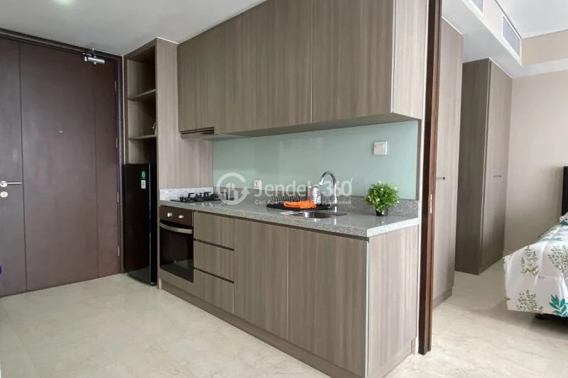 Kitchen Low Floor 1BR Apartment with - View at Ciputra World 2 Apartment