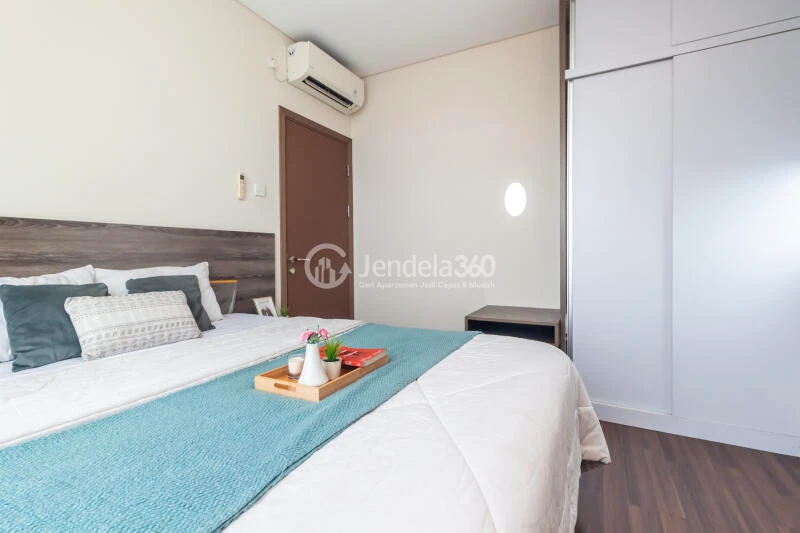 Bedroom 1 High Floor 2BR Apartment with City View at Puri Orchard Apartment