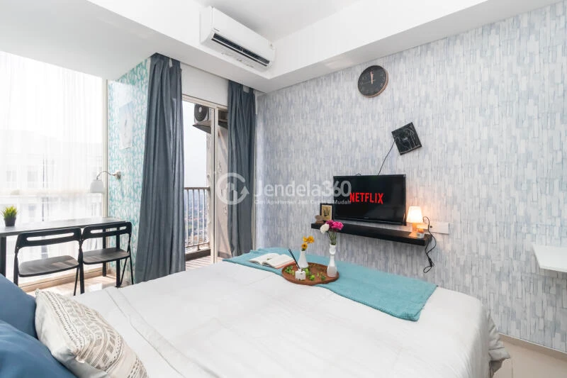 Bedroom Cozy Studio Apartment High Floor with City View at Pacific Garden Apartment