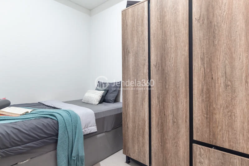 Bedroom 2 Low Floor 2BR Apartment with Pool View at Fatmawati City Center Apartment