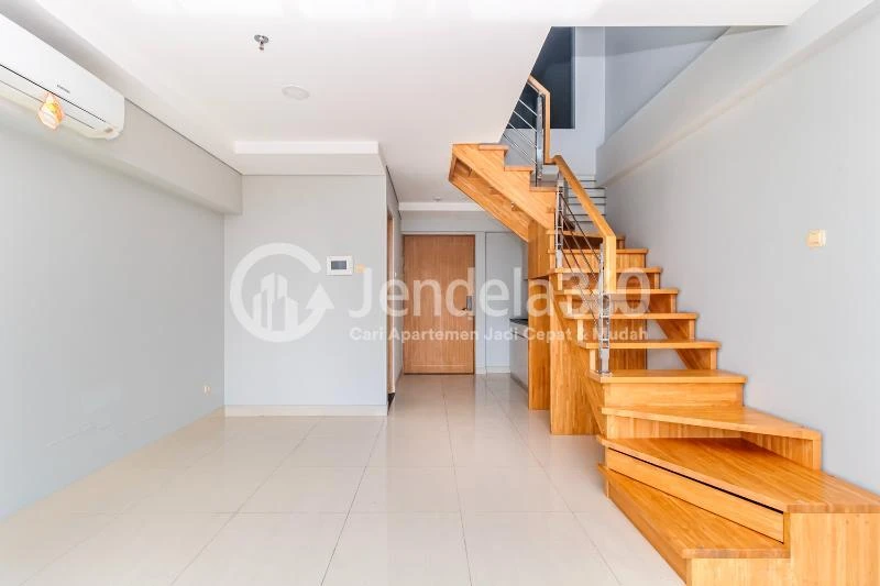 Living Room 2BR Maqna Residence Apartment at Low Floor