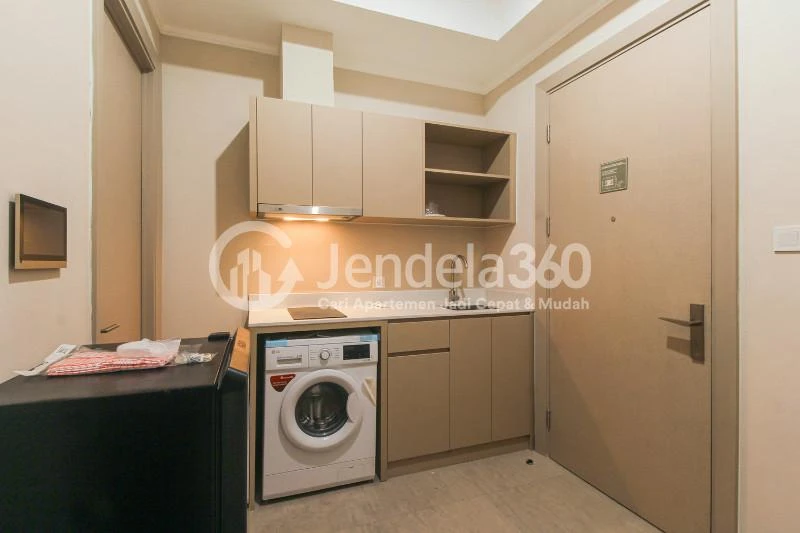 Living Room 1BR Apartment with City View at Menara Jakarta Apartment