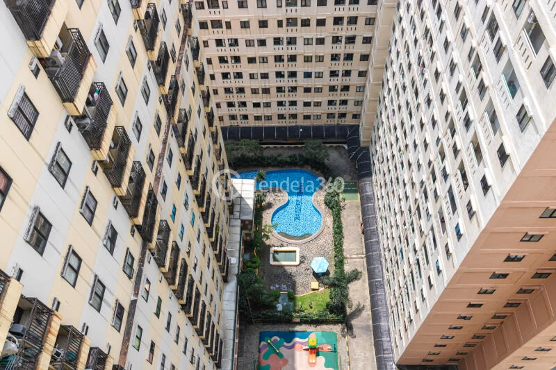Balcony High Floor Studio Apartment with City & Pool View at Kebagusan City Apartment