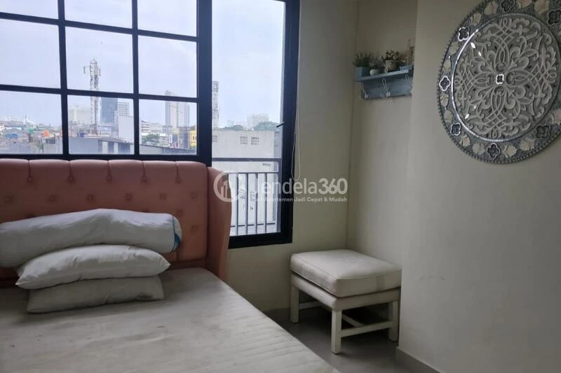 Bedroom Homey Studio Apartment at Evenciio Apartment Low Floor