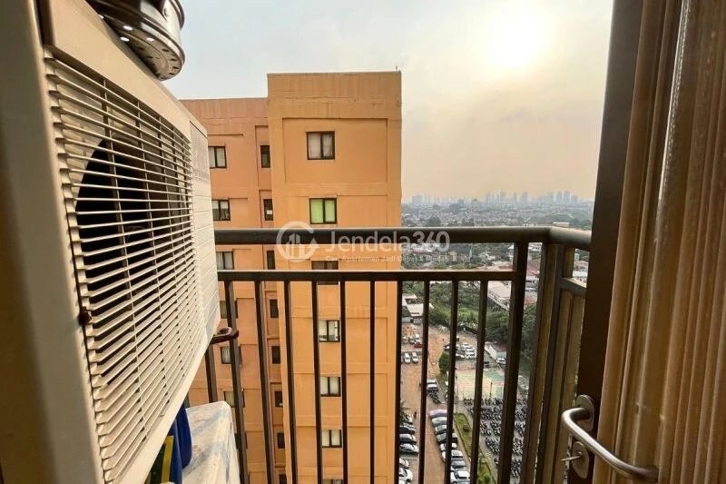 Balcony Trendy 2BR Apartment Middle Floor with Swimming Pool View at Kebagusan City Apartment