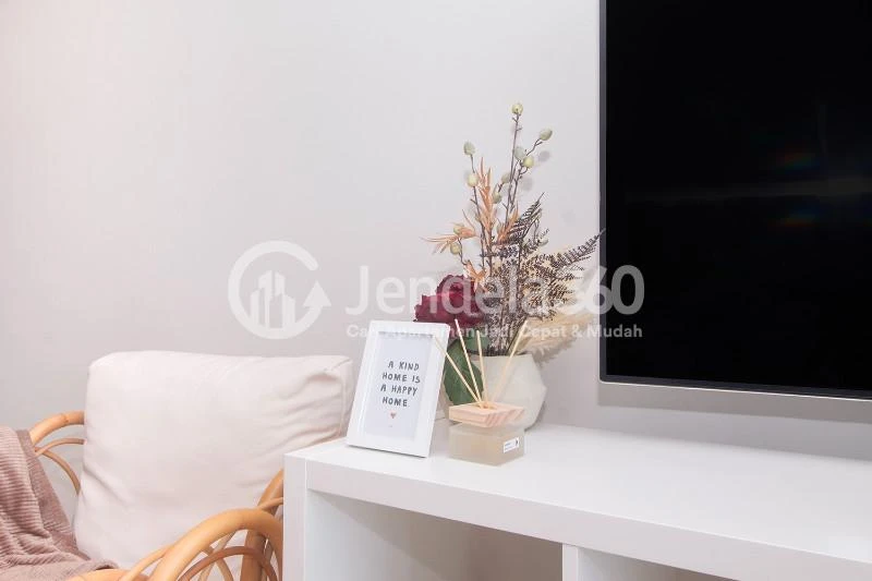 Living Room Well Furnished 2BR Apartment Close to MNC Studio Kebon Jeruk at Maqna Residence
