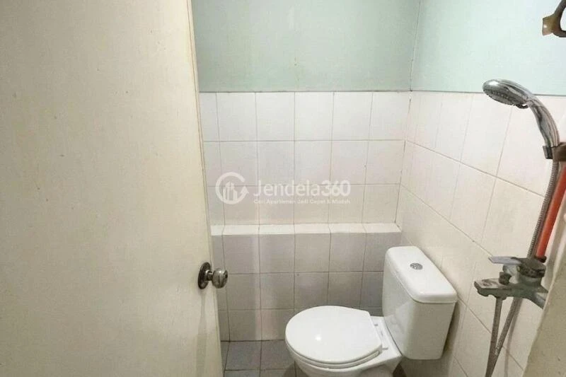 Bathroom High Floor 2BR Apartment with City View at Kalibata City Apartment