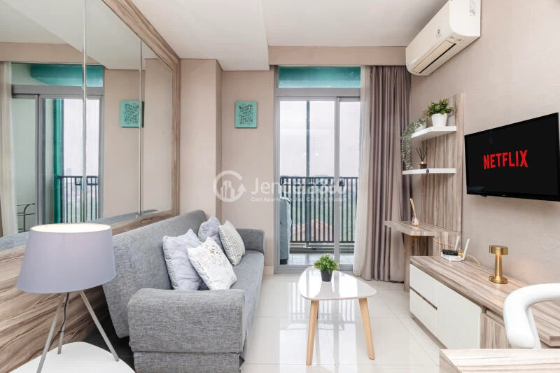Living Room Low Floor 1BR Apartment with City View at Pejaten Park Residence
