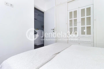 Bedroom 1 High Floor 2BR Apartment with  View at Green Pramuka City Apartment