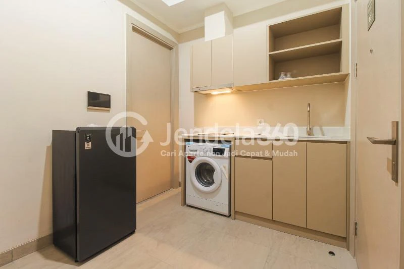 Living Room 1BR Apartment with City View at Menara Jakarta Apartment