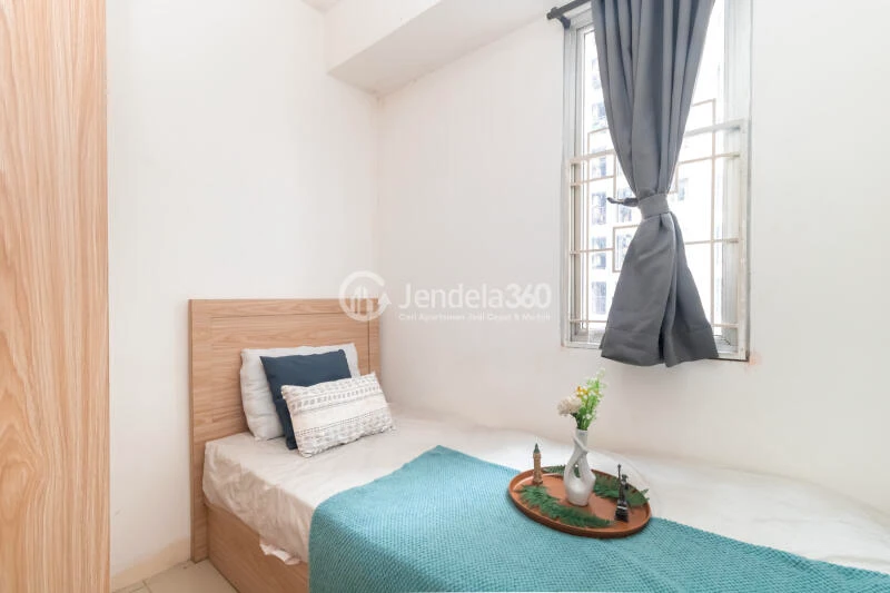 Bedroom 3 Peaceful 3BR Apartment at Bassura City Apartment Tower Geranium