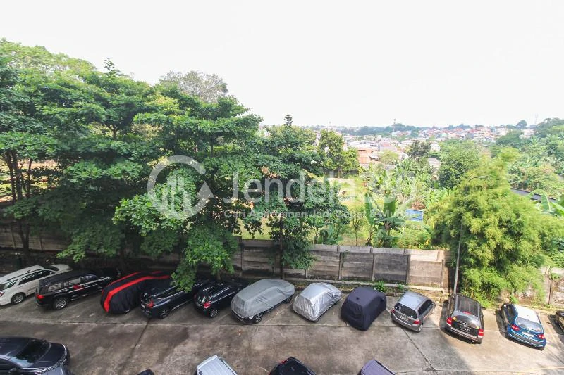 Balcony Low-Cost Studio Apartment with City View at Kebagusan City Apartment