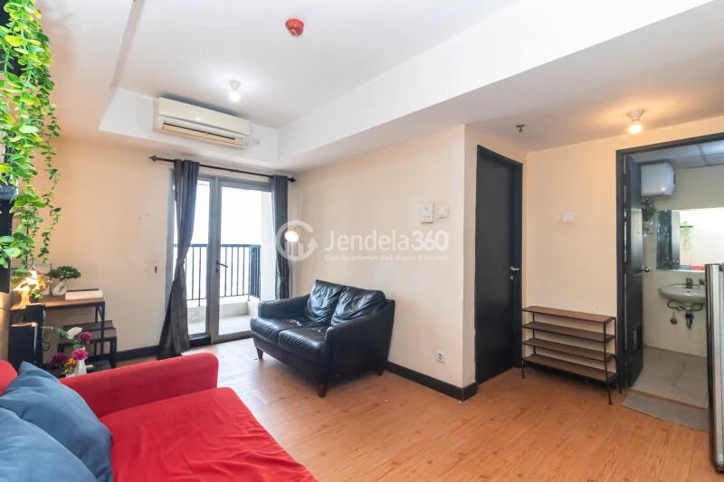 Living Room 1BR Apartment with City View at The Wave Apartment