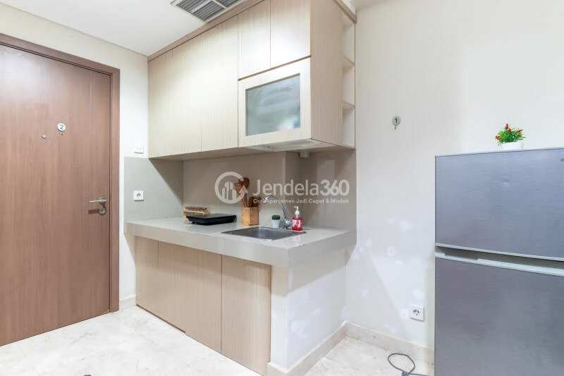 Kitchen Low Floor 1BR Apartment with city View at Puri Orchard Apartment