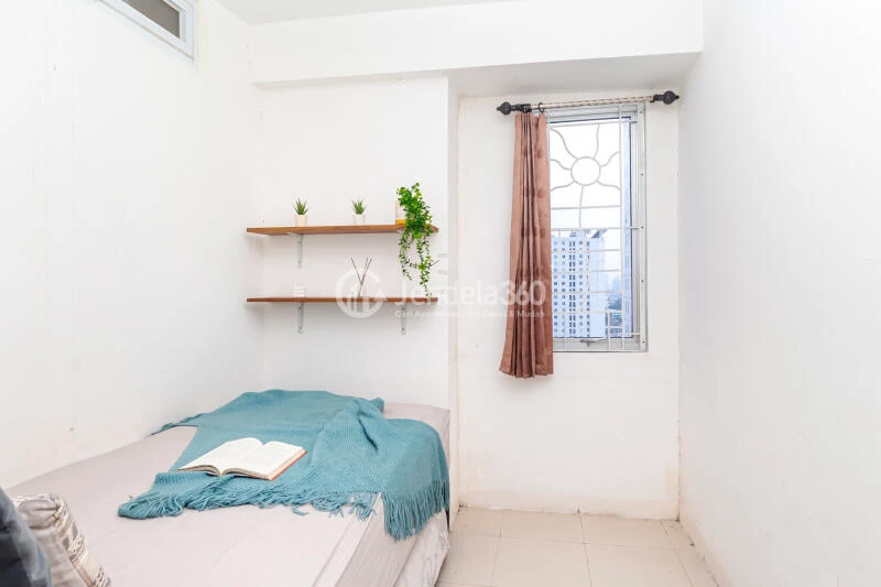 Bedroom 2 High Floor 3BR Apartment with City view View at Bassura City Apartment