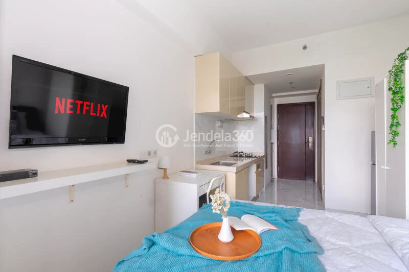 Bedroom Elegant Studio Apartment with City View at Sky House BSD Apartment
