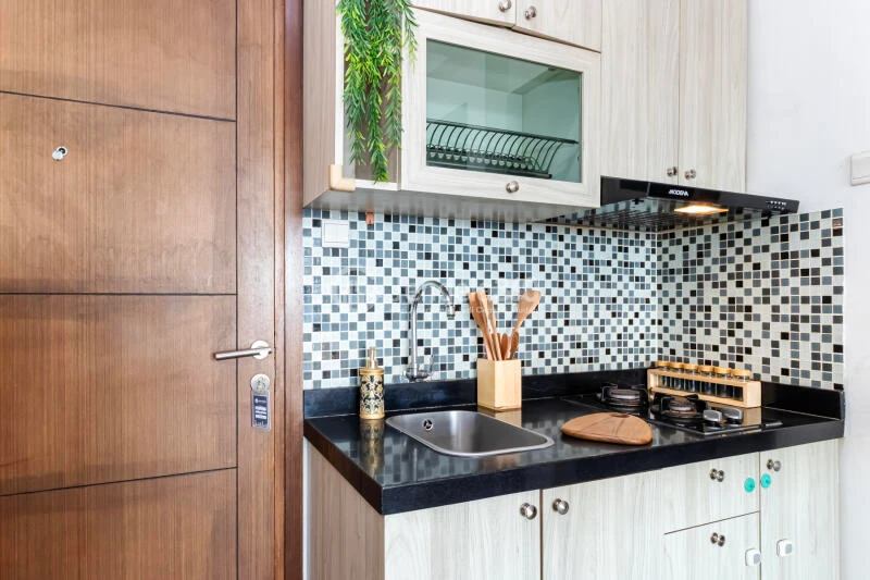 Kitchen 2BR Aspen Residence Apartment at Middle Floor with An Eye Pleasing Interior