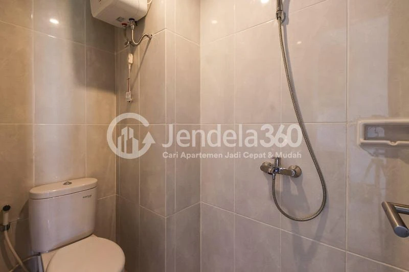 Bathroom Comfy Studio Apartment at Serpong Garden Apartment, Close to BSD