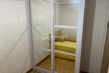 Bedroom 2 3BR Apartment with cITY View at Gateway Apartment